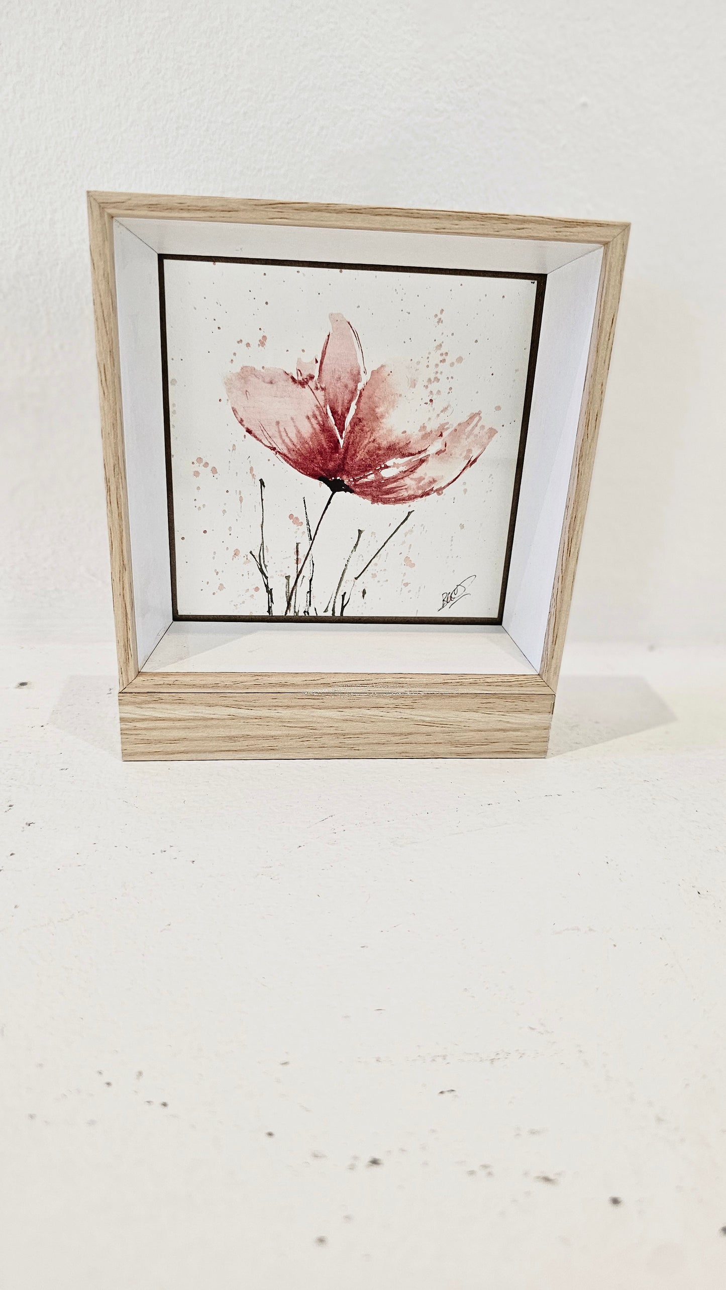 La fleur dans le vent