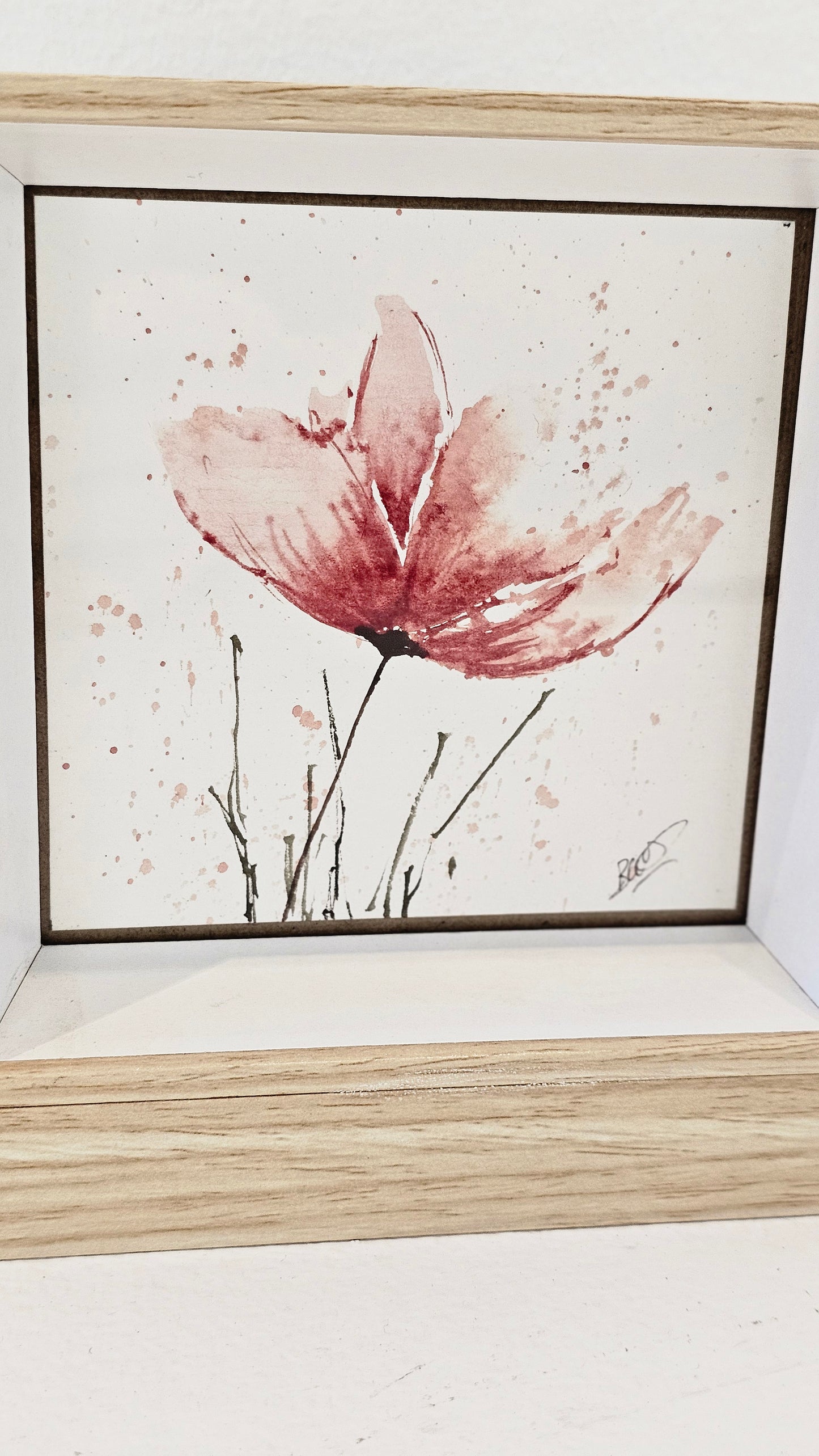 La fleur dans le vent