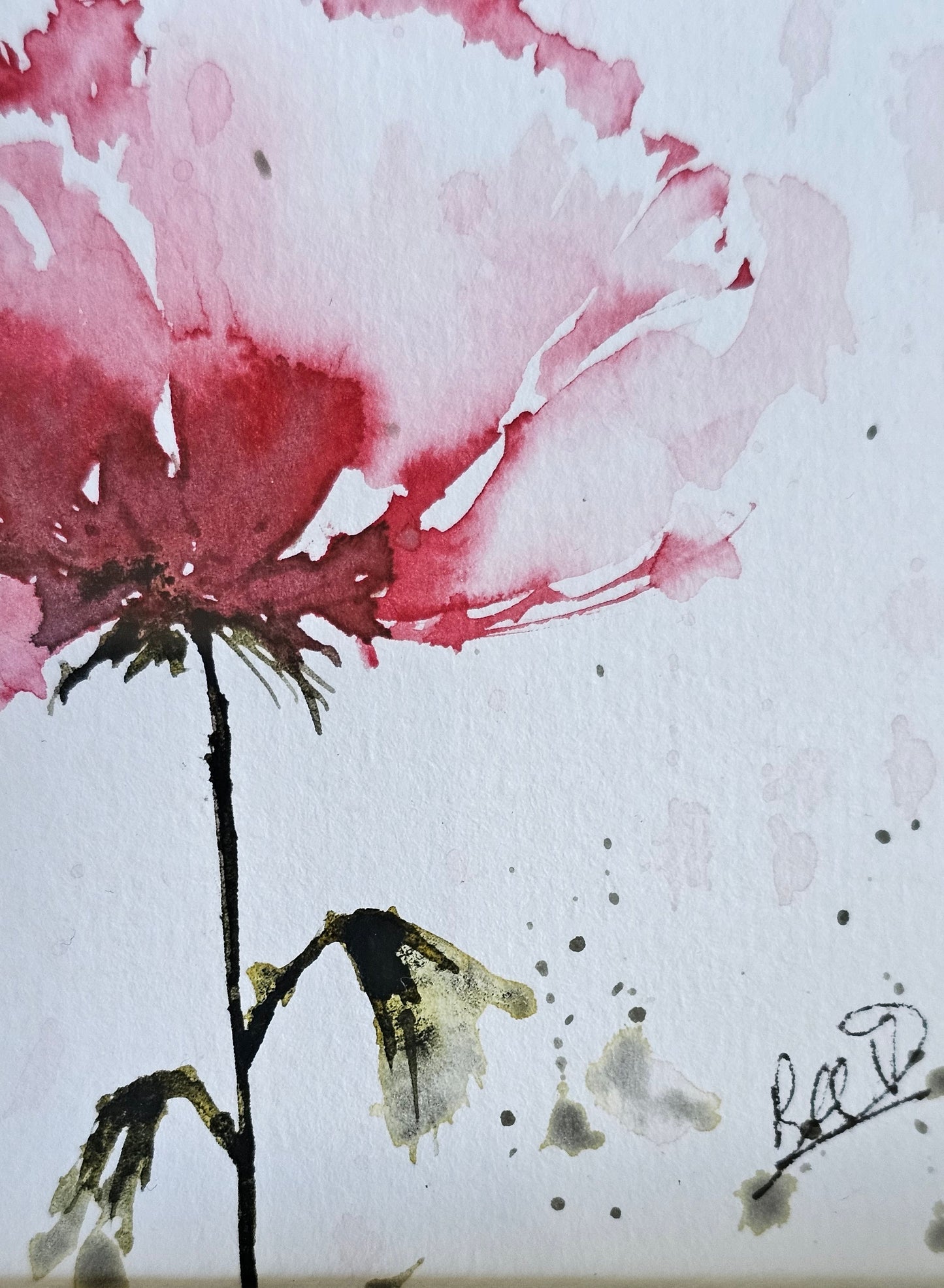 Une petite fleur rose