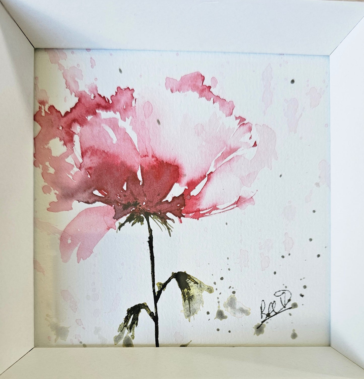 Une petite fleur rose