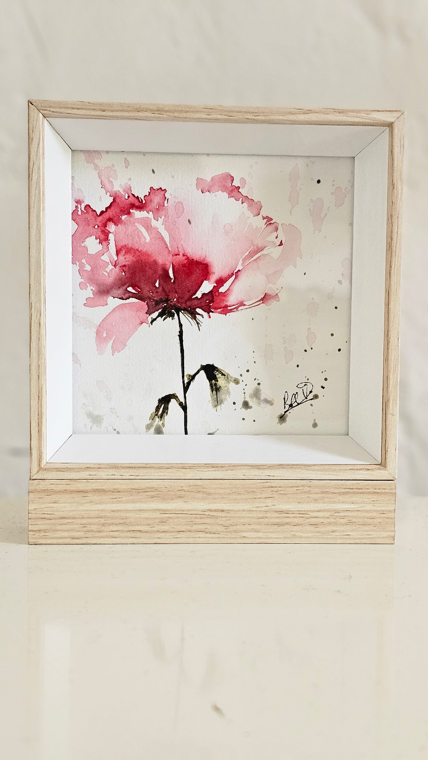 Une petite fleur rose