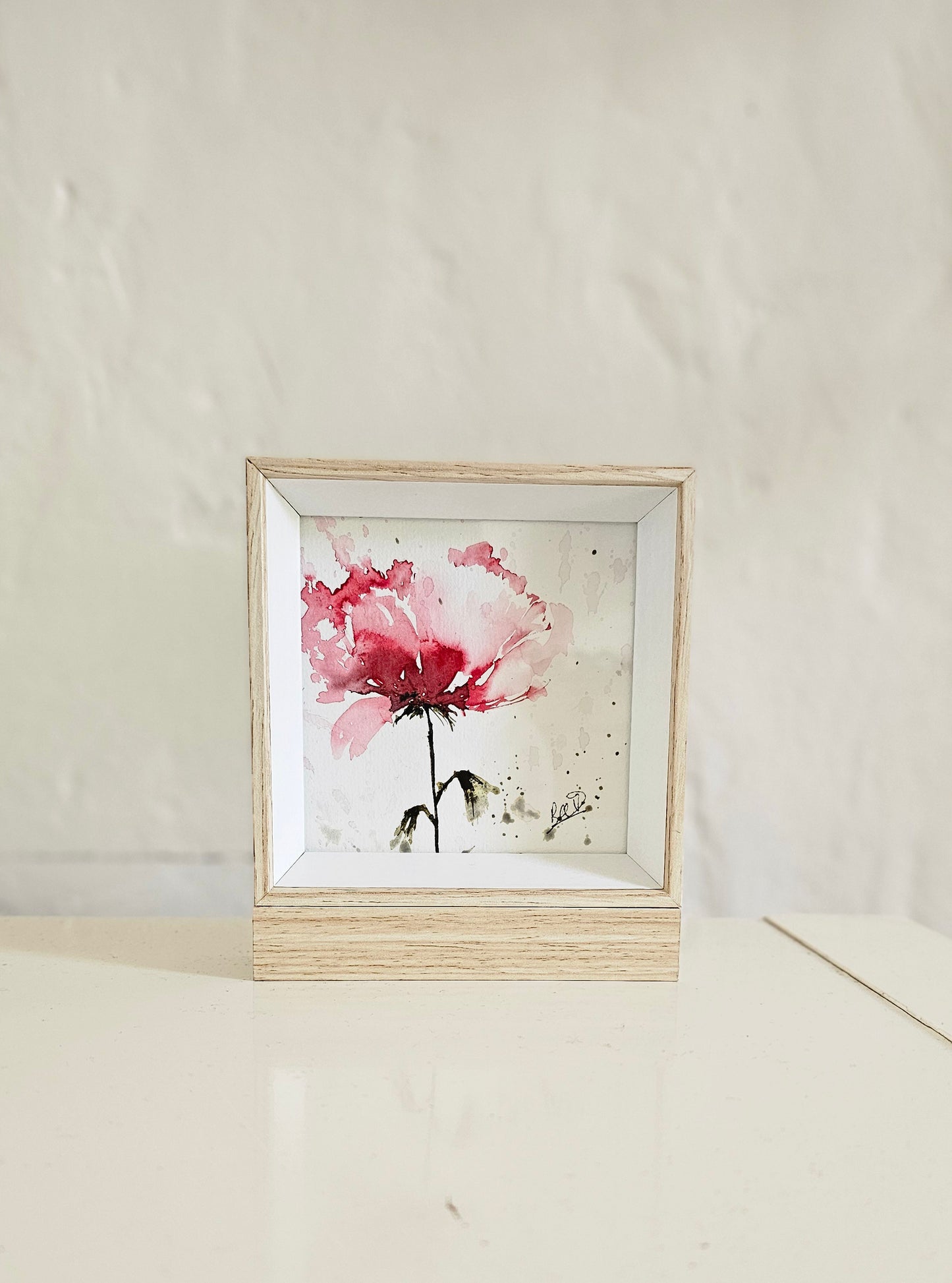 Une petite fleur rose
