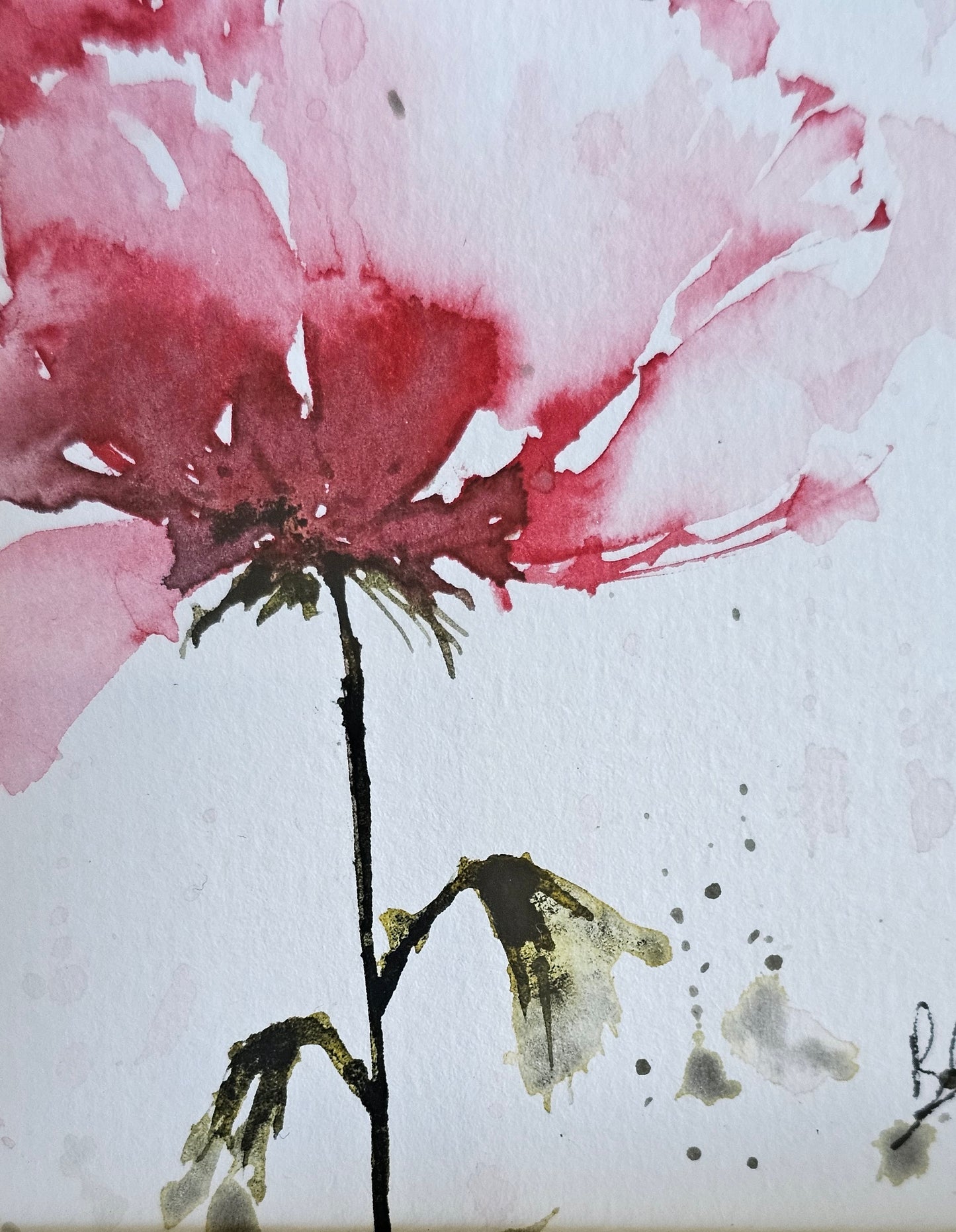 Une petite fleur rose